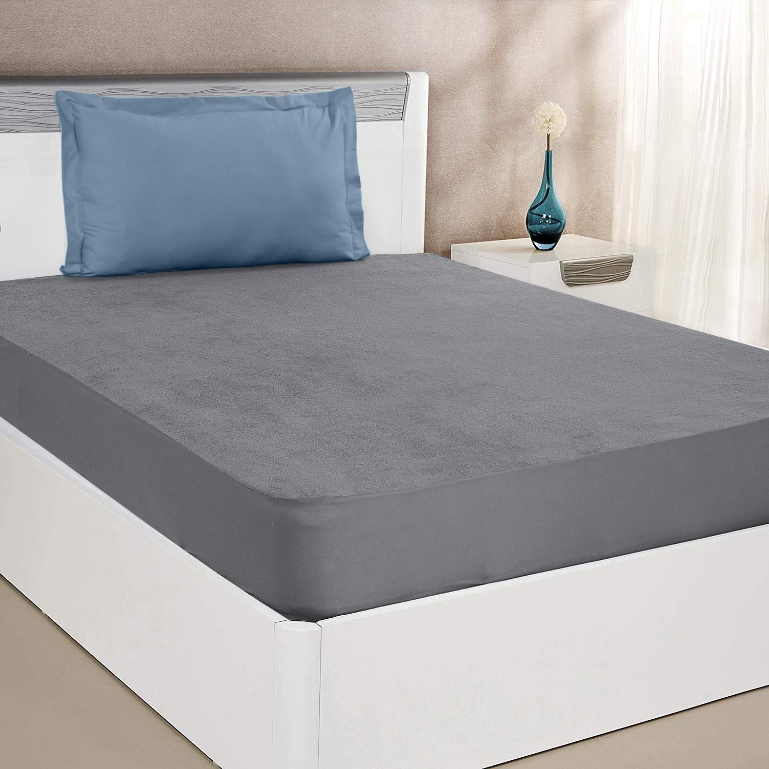 71tdyJc80oL.jpg AmzonBasics Water Resistant Mattress Protector 75X38 - Image 1